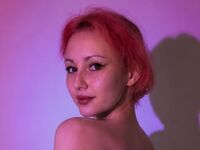 camslut showing tits ElanaHelfert